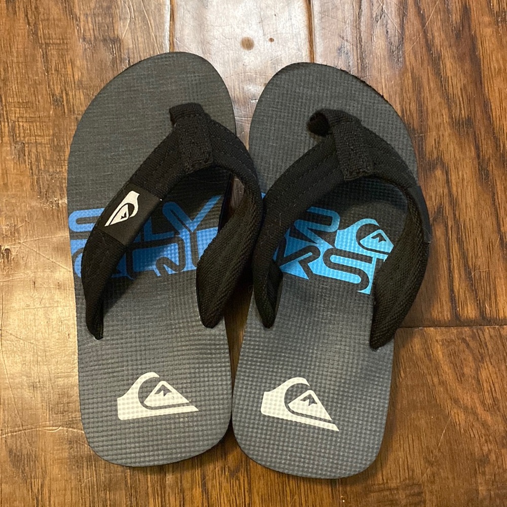 Quicksilver flip flops size 13. EUC